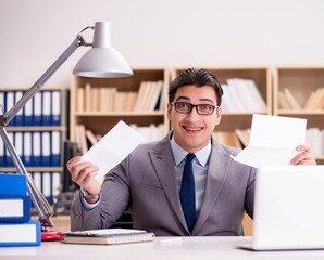 Businessman receiving letter in the office