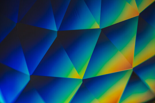 abstract multicolored prism background with triangles