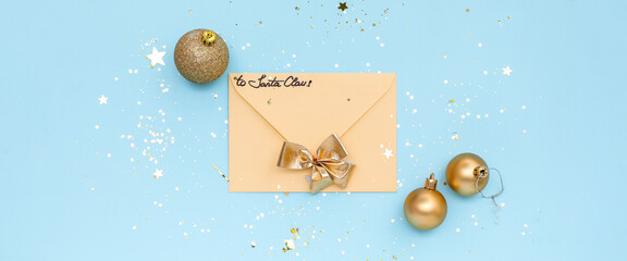 Letter to Santa and Christmas ball on light blue background