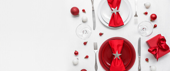 Beautiful Christmas table setting on white background with space for text