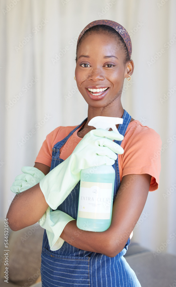 Wall mural Black woman, spring cleaning service and spray bottle for housekeeping, sanitation and disinfection of dirt, bacteria and dust in home. Portrait happy maid, hospitality cleaner and house maintenance