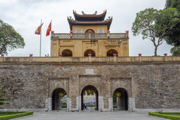 Yellow brick traditional Vietnamese architecture entrance gate design at the Imperial Citadel of...