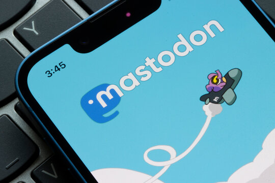 Portland, OR, USA - Nov 8, 2022: Mastodon logo is seen on the login page of the Mastodon app on an iPhone. Mastodon, a decentralized platform, rapidly gains users after Elon Musk's Twitter takeover.