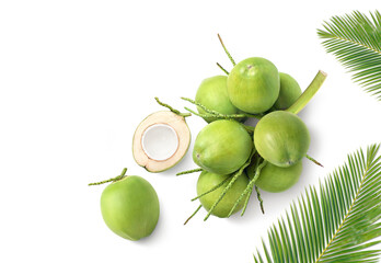 Top view of young green coconut with leaves isolated on white background. - obrazy, fototapety, plakaty