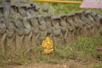Yellow Ganesha sculpture