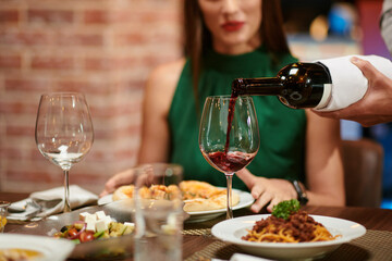 Waiter Filling Wine Glass