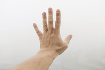 hand showing five fingers