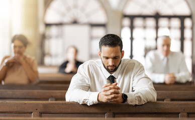 Church, prayer and man praying to God, worship or religion in cathedral. Faith, spiritual and...