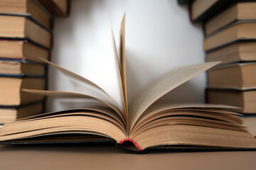 stack of books, open book. page movement