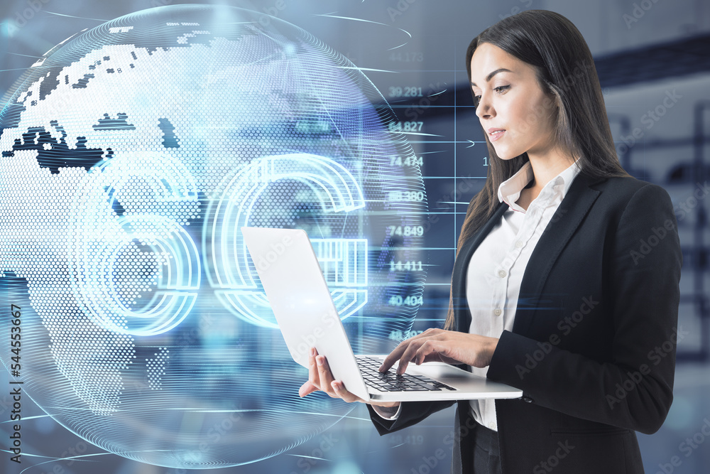 Poster businesswoman using laptop with glowing planet earth globe hologram with 6g and index graph on blurr