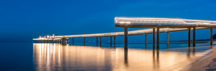 Seebrücke in Koserow auf Insel Usedom am Abend - Panorama - obrazy, fototapety, plakaty