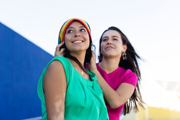 Beautiful lesbian young couple enjoy outside. LGBT community...