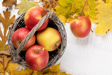 Red garden apple in basket