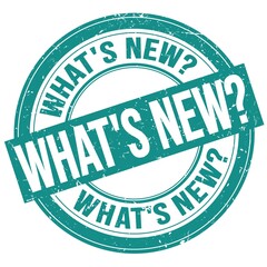 WHAT'S NEW? text written on blue round stamp sign