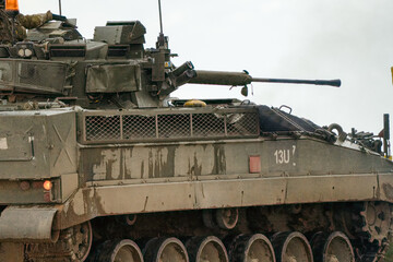 British army Warrior FV510 fighting vehicle tank at a road crossing, Wilts UK