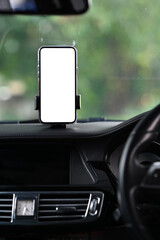 Smart phone with blank screen in car windshield holder. Empty screen for your advertise design