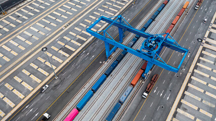 Aerial view of shipping container rail terminal, Train wagon cargo container for shipping, Aerial...