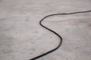Wires on the floor. Selective focus.