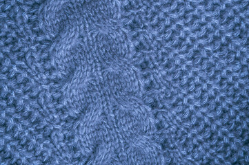 Organic knitting material with macro weave threads.
