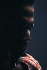 Dark, man and face of warrior thinking or ready for war, battle or ring match against a mockup...