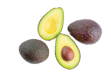 whole and half avocado isolated on transparent background close-up.