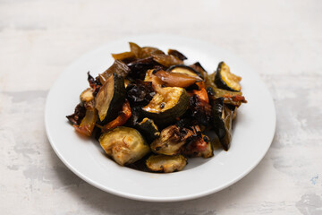 baked vegetables in white small beautiful bowl