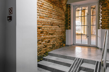 Empty rooms in modern and old style with a vaulted ceiling made of clay brick