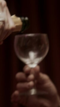 Close up of champagne being poured into a glass
