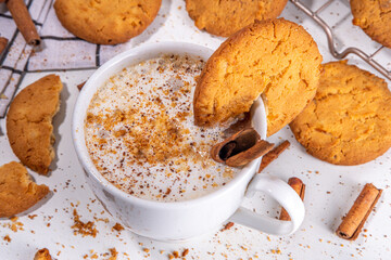 Snickerdoodle latte coffee, with whipped cream, spices, cinnamon and Snickerdoodle cookies crumble topping