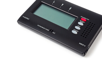 Tuner for tuning a bass guitar, compact, on a white background.