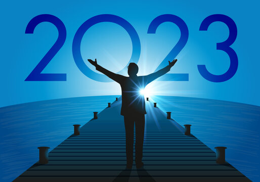 Carte de vœux 2023 sous le signe de l’espoir, avec un homme d’affaire optimiste, qui lève les bras vers une nouvelle année qui annonce une reprise économique.