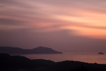 Light brown yellow and orange sunrise sky colors background. Sunset over the sea and mountains. Nature landscape backgrounds. Copy space. Inspirational backgrounds.