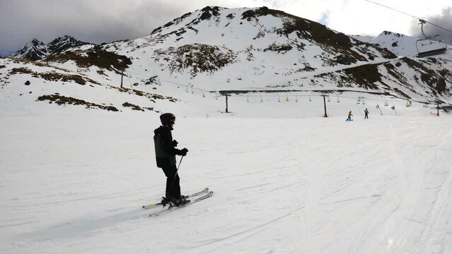 People Skiing In Remarkables Ski Resort In Queenstown, New Zealand. Tracking Shot