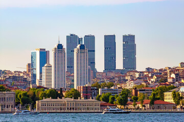 Istanbul skyline as seen from ferry boats crossing Bosporus. Beyoglu district, Sisli towers and European side of the city. Istanbul, Turkey (Turkiye)