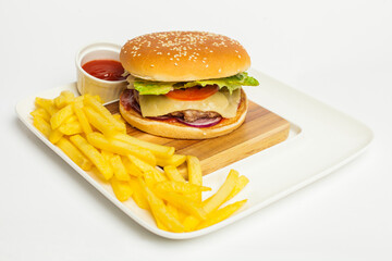 tasty Craft beef burger and french fries on wooden plate  on white background.