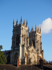 The historic Minster at York seen above the roofs of some terraced housing