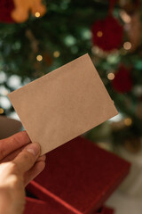 New Year's post craft card for an inscription on the background of a Christmas tree and lights