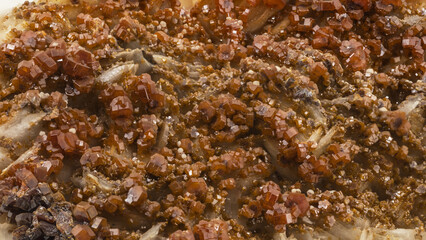 orange-red tabular crystals of vanadinite, lead ore belonging to the eighth class