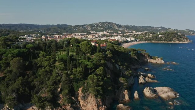 Drone flying around Santa Clotilde garden near Lloret del mar Spian