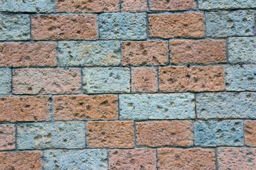 Texture stone wall , briquette color and light blue , stone look background.
