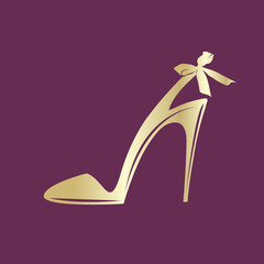 Golden high heel sandal with decorative bow.Elegant shoe.Footwear logo isolated on purple background.Fashion and style icon.Luxury, feminine design.