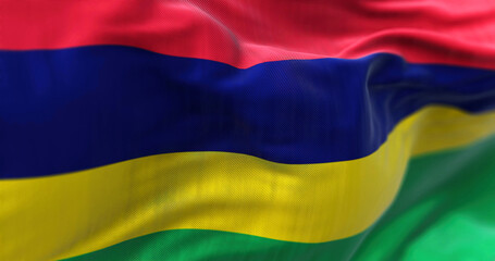 Close-up view of the Mauritius national flag waving in the wind.