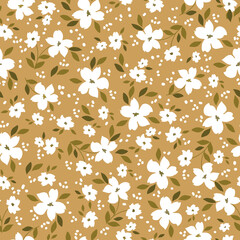Cute floral pattern. Seamless vector texture. An elegant template for fashionable prints. Print with white flowers,gold  leaves . mustard background.