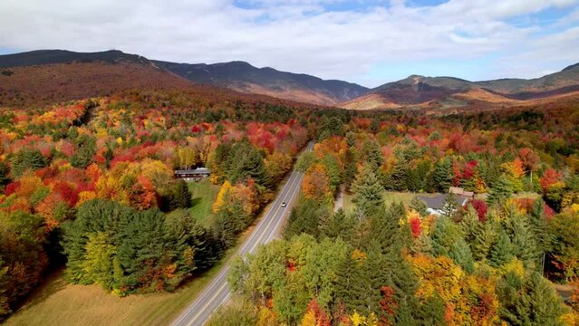 aerial pullout brilliant fall colors in stowe vermont
