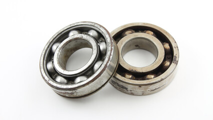 Old rusty bearing on a white background