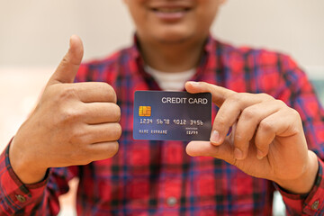 Business man use Credit card for Shopping online, Asia man use computer meeting with team for contact project business technology, financial business man.