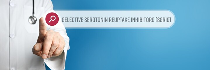 Selective serotonin reuptake inhibitors (SSRIs). Doctor in smock points with his finger to a search...