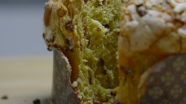 Traditional Italian homemade Christmas panettone typical of Milan with almonds, chocolate drops and sugar