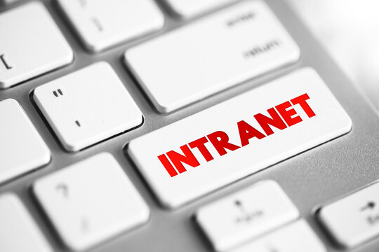 Intranet - computer network for sharing information, collaboration tools, and other computing services within an organization, text concept button on keyboard
