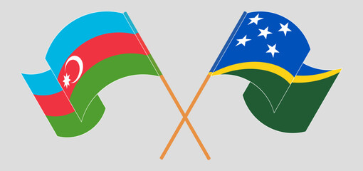 Crossed and waving flags of Azerbaijan and Solomon Islands
